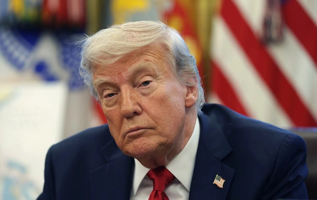 Tổng thống Mỹ Doanld Trump trong cuộc họp báo hôm 23-4 tại Phòng Bầu dục